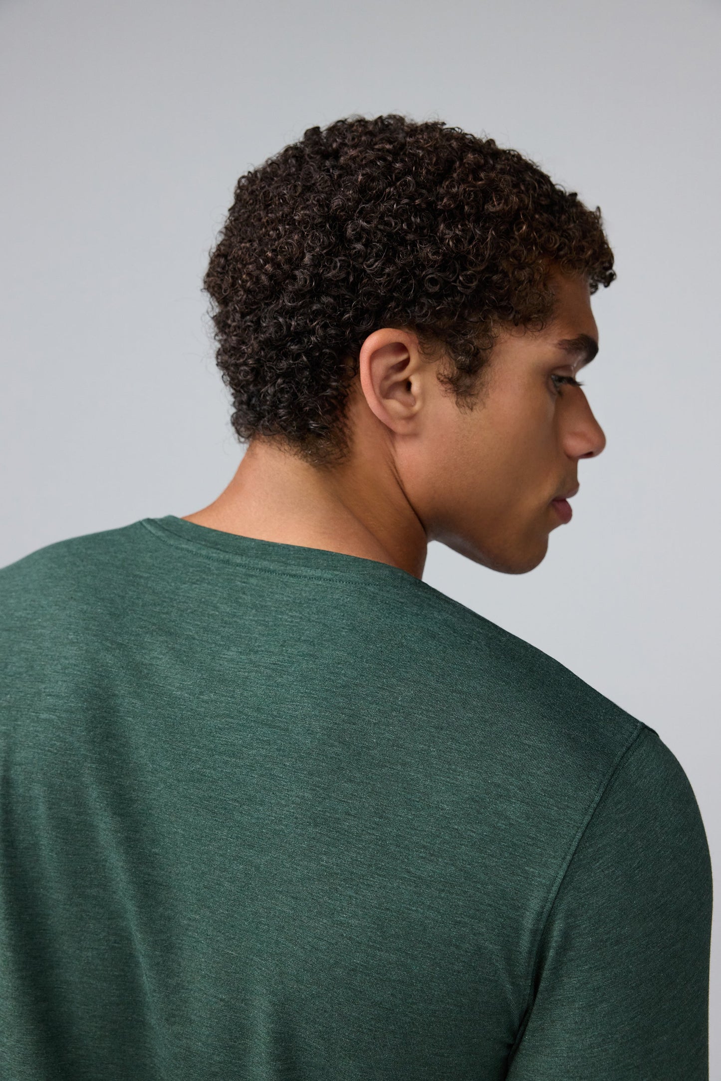 Detail back view of man wearing SILVER Long Sleeve T-Shirt in Tannenbaum Heather