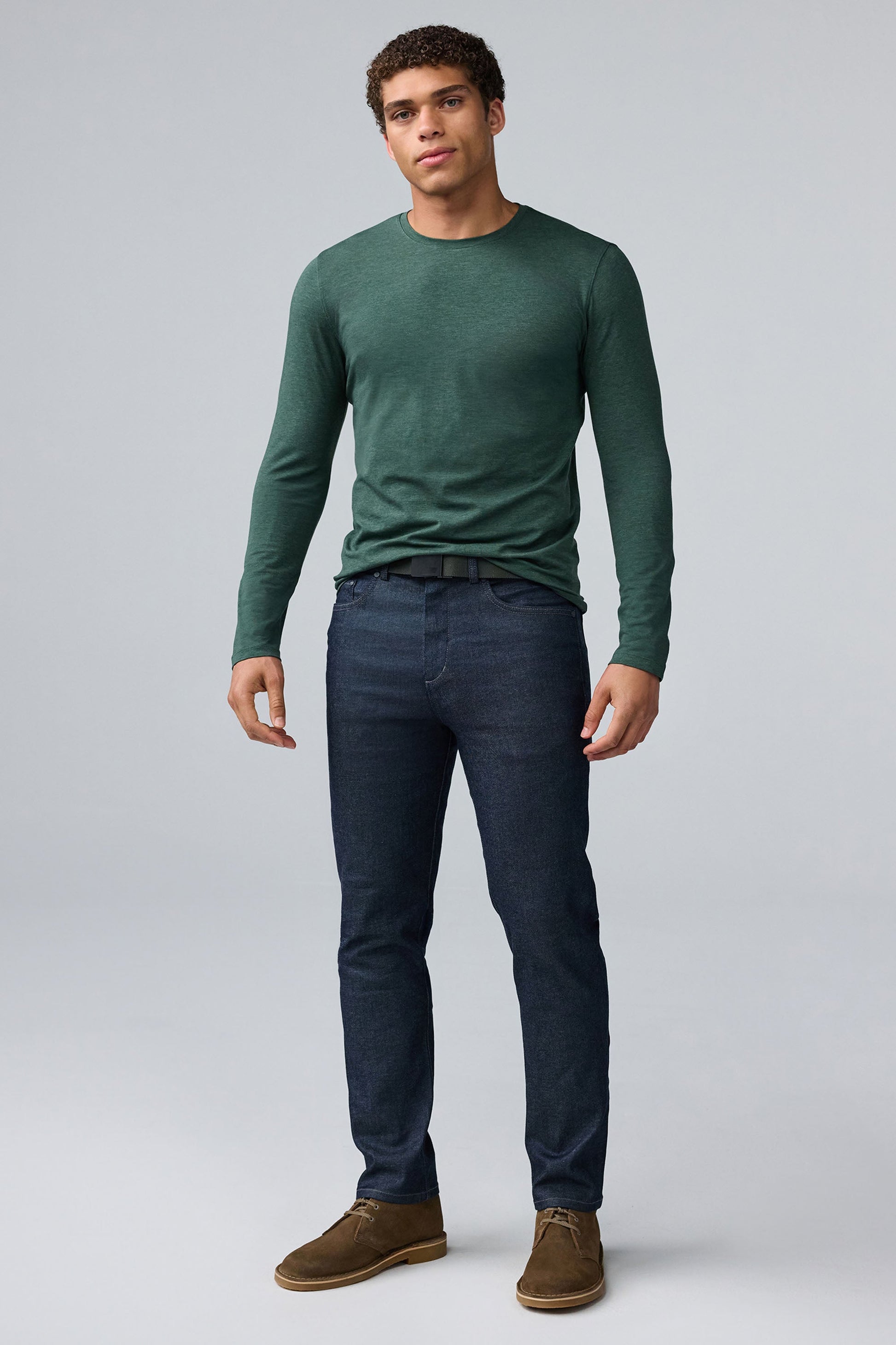 Full body front view of man wearing SILVER Long Sleeve T-Shirt in Tannenbaum Heather