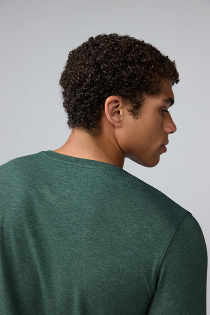 Detail back view of man wearing SILVER Long Sleeve T-Shirt in Tannenbaum Heather