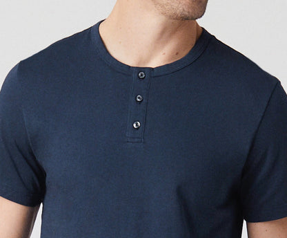 Front close up view of man wearing Pima Short Sleeve Henley in True Navy