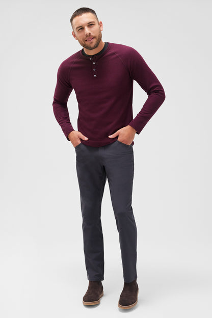 Front view of a man wearing WARMKNIT Waffle Henley in Lambrusco Heather